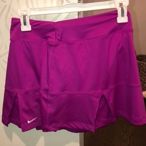 two nike tennis skirts (shorts underneath)